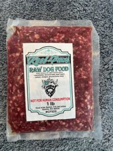 One-pound package of Kool-Paws raw dog food made from ground beef heart, spleen, tongue and bone meal