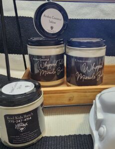 Jars of Kool Kids Ranch small-batch pork lard and beef tallow cooking oil in a gift box